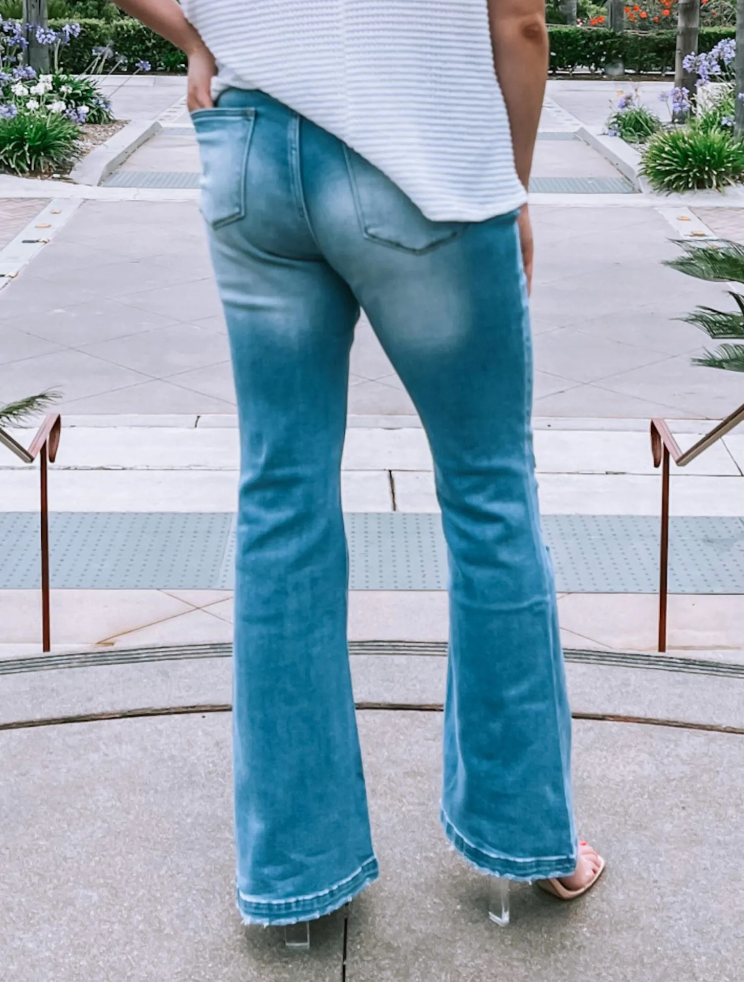 Plus Size High Rise Light Distressed Button Fly Flare Jeans In Blue Jeans